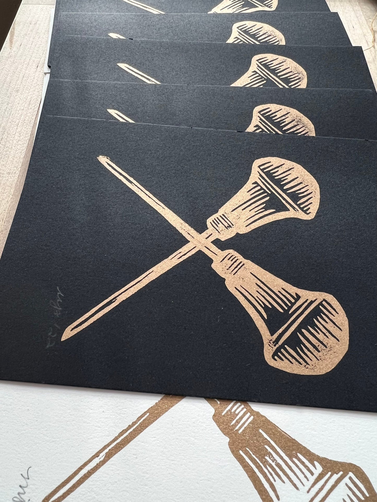 Crossed Carvers Linocut - Gold and Black